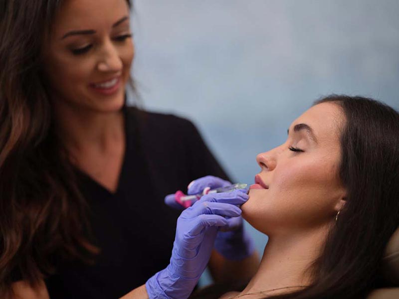 Azure--July22-202431002 woman getting filler injection in lip